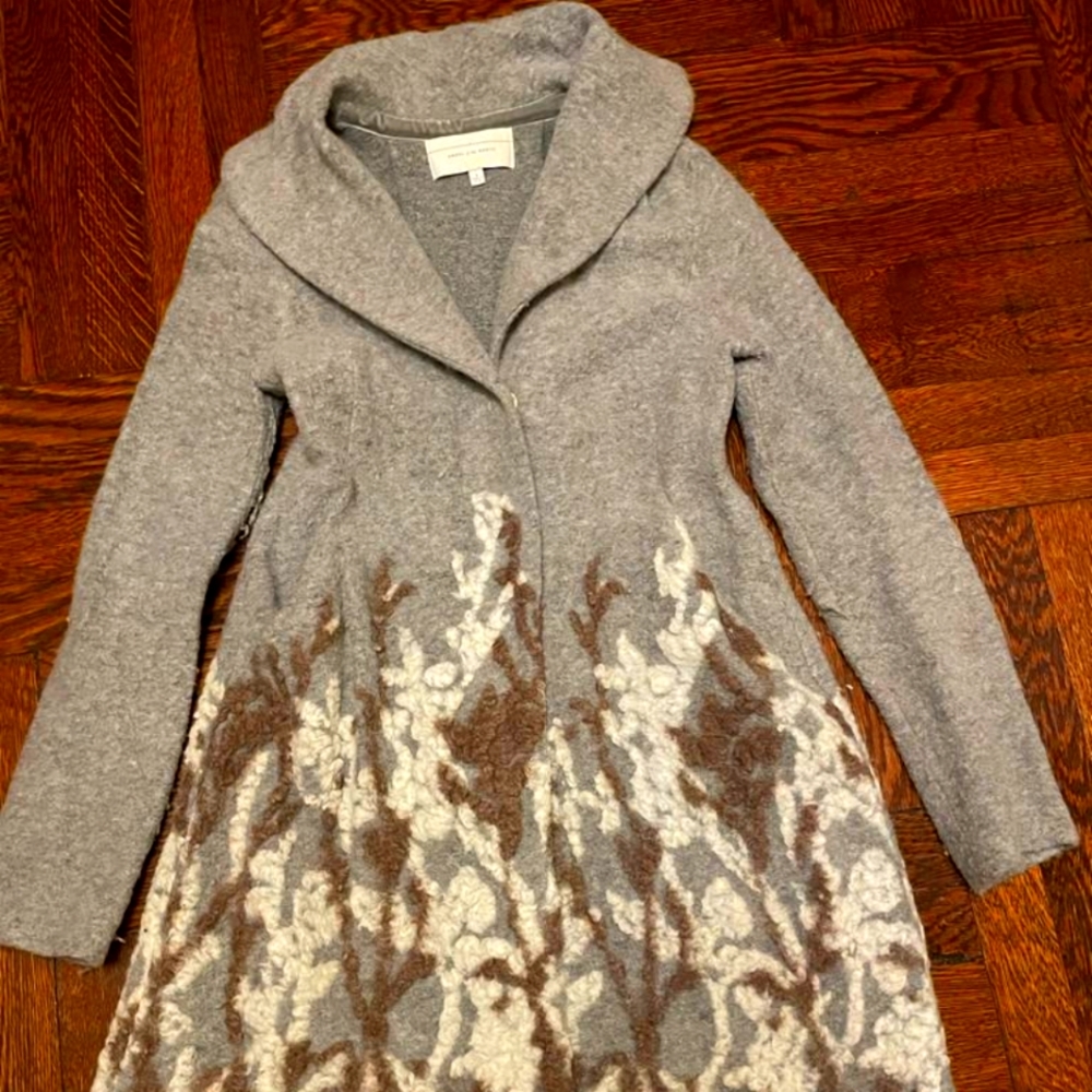 Anthropologie fitted sweater-coat with feminine silhouette.